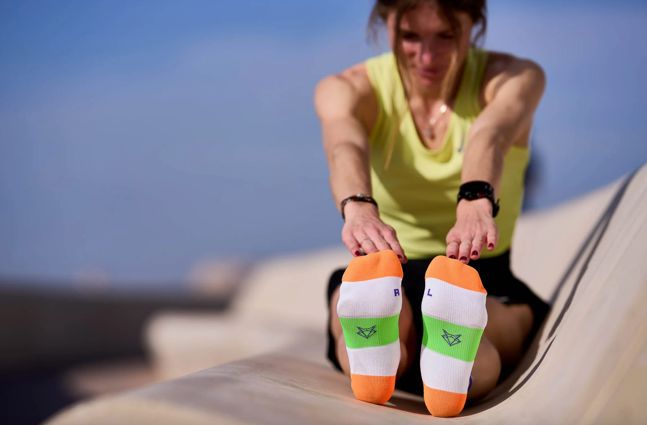 INCYLENCE RUNNING LADDERS SHORT ORANGE GREEN