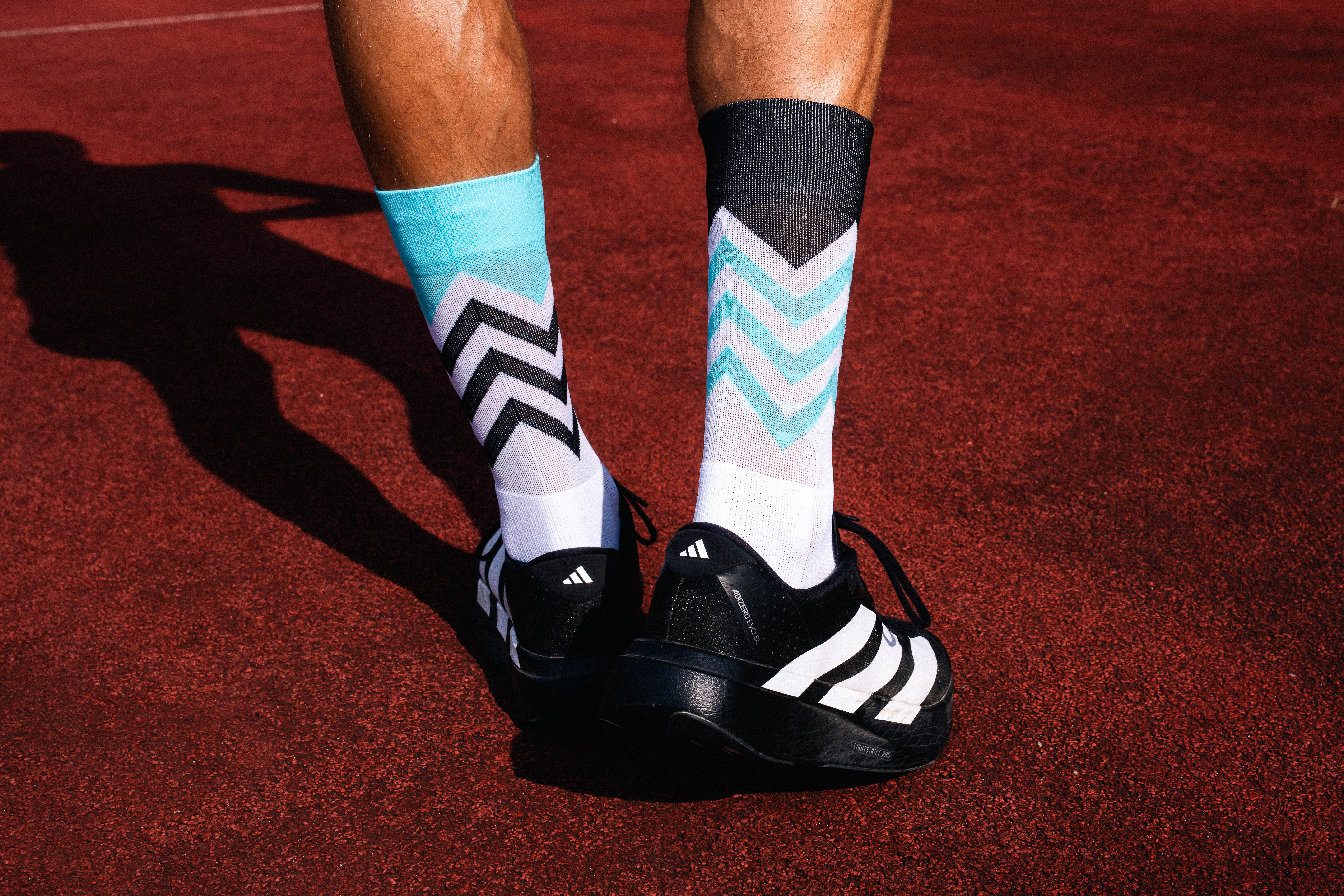 INCYLENCE RUNNING VOLTS CYAN BLACK