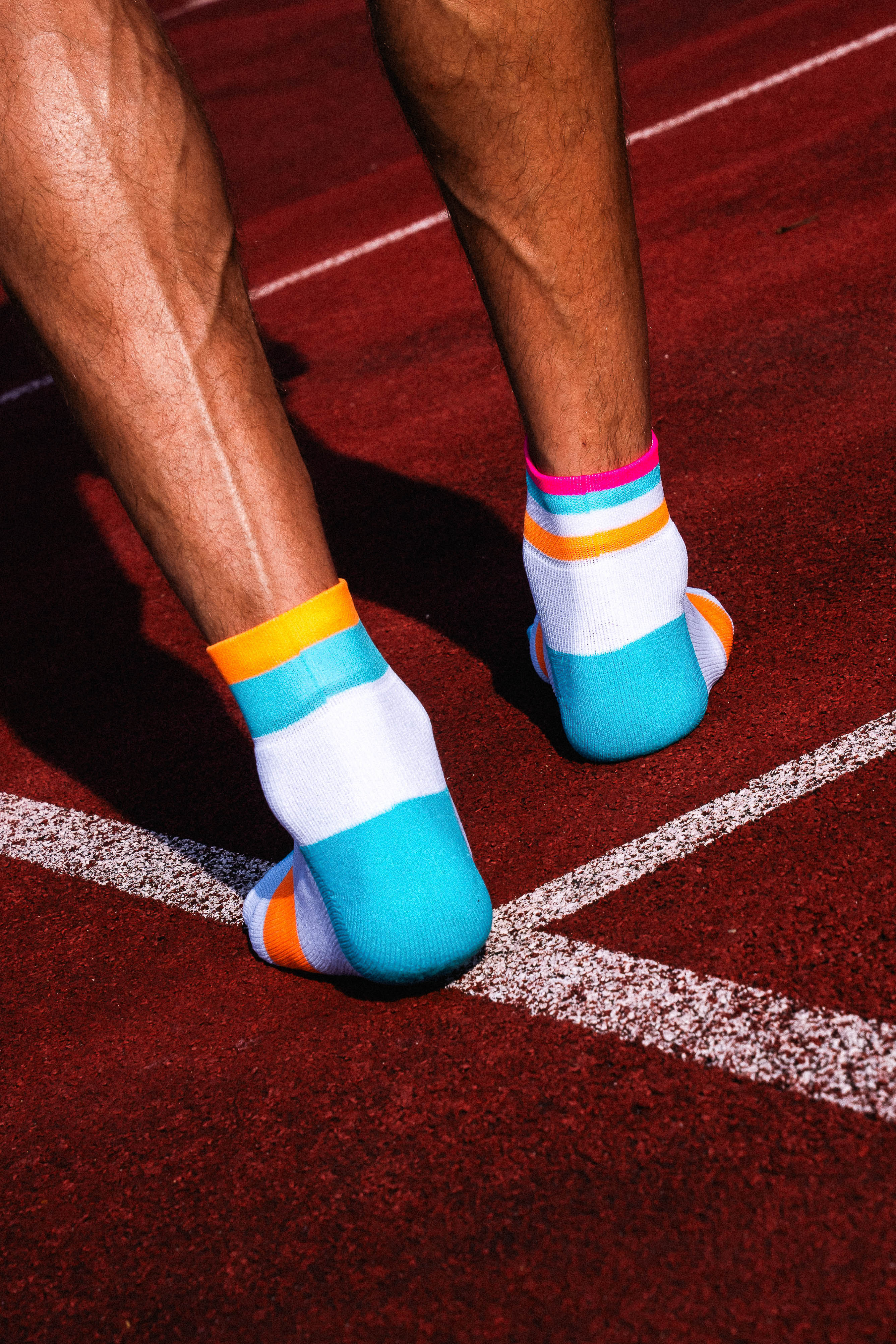 INCYLENCE RUNNING BANDS SHORT CYAN ORANGE