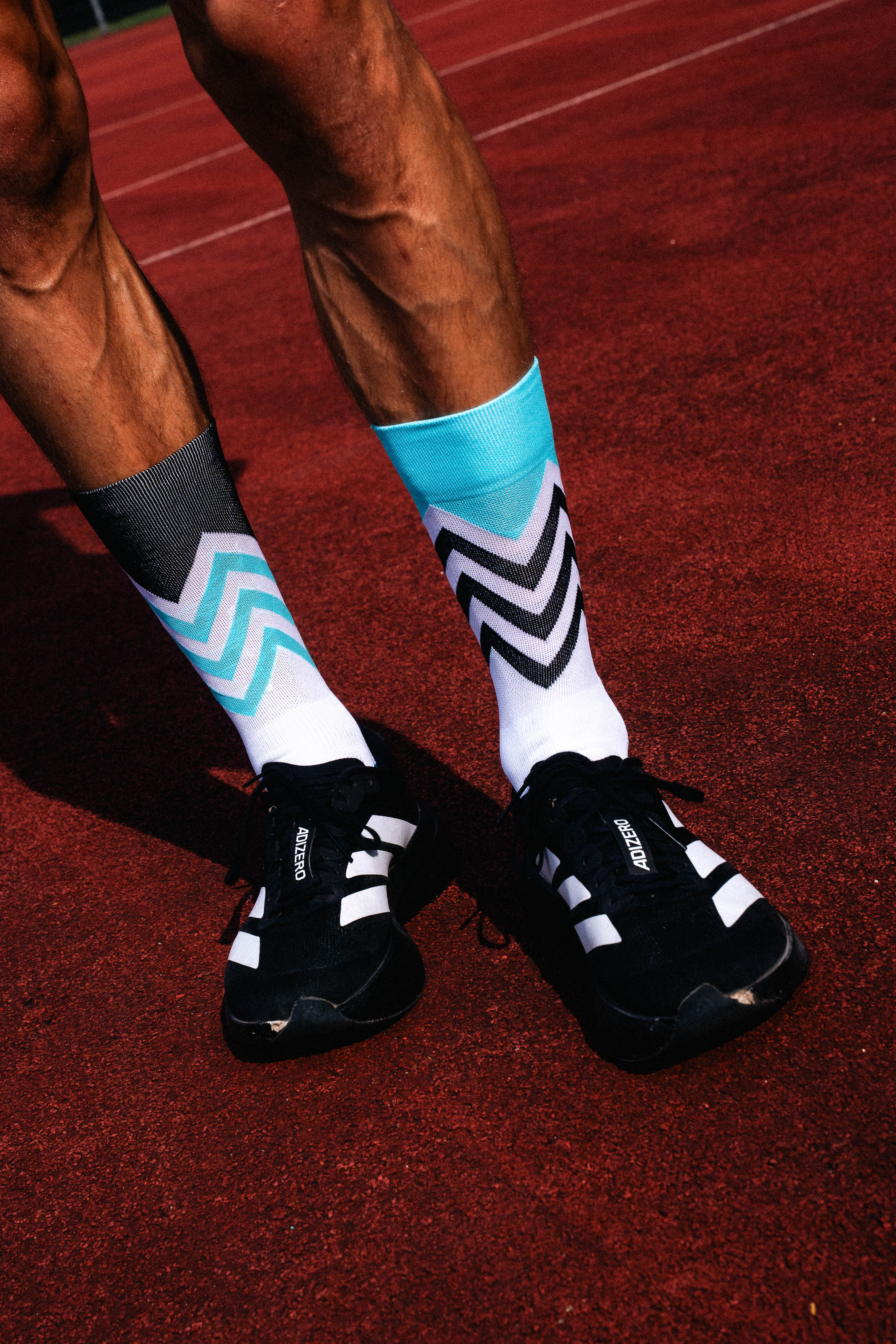 INCYLENCE RUNNING VOLTS CYAN BLACK