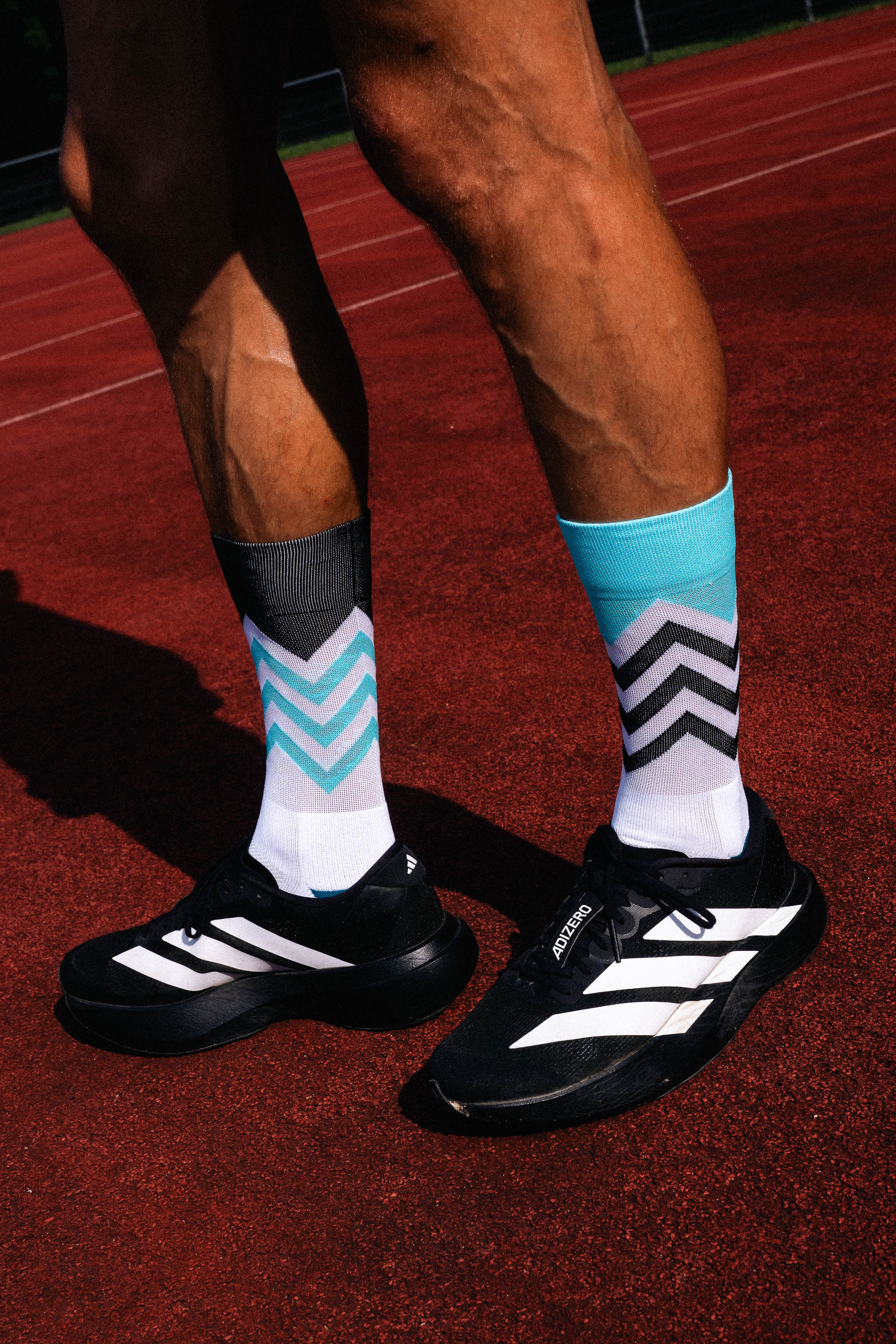 INCYLENCE RUNNING VOLTS CYAN BLACK